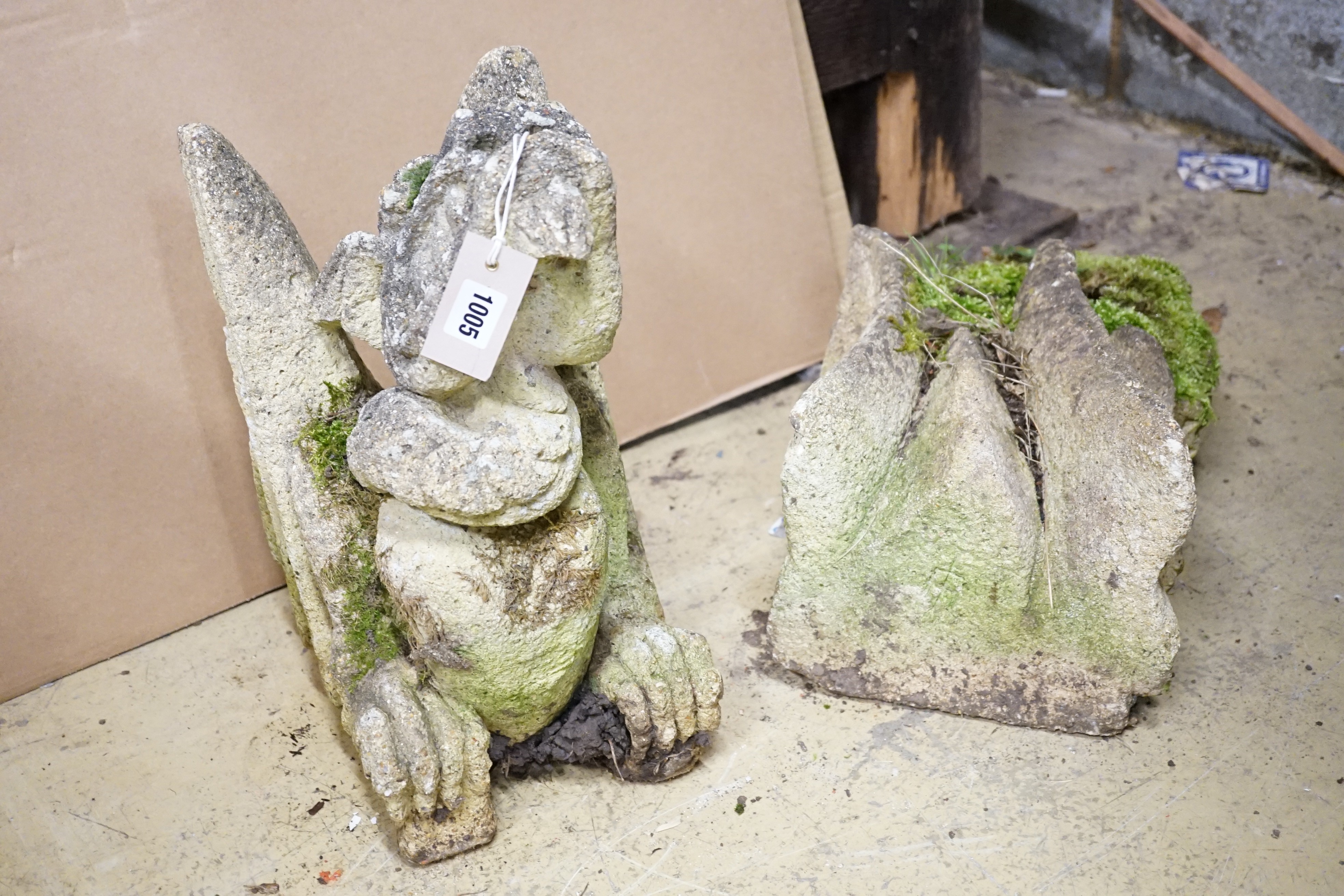 A reconstituted stone dragon gargoyle, 43cm and another similar carving